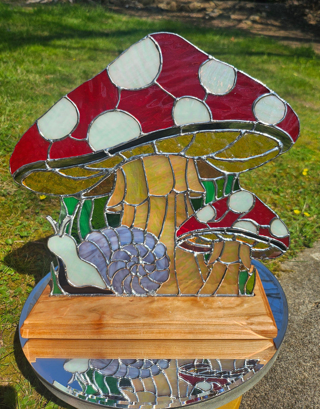 Snails Rest Beneath The Red Caps